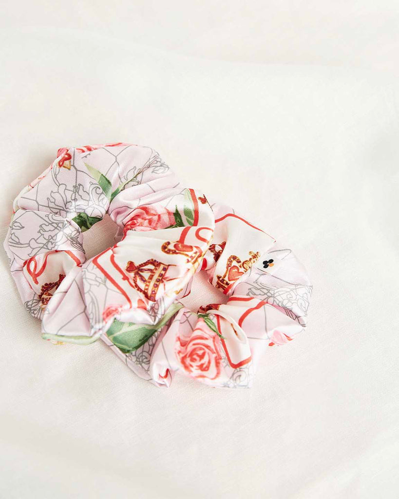 Bella Descanso luxury satin scrunchies in Queen of Hearts Valentine's Day print. The perfect glam and stylish hair accessory to add colour to any outfit. 