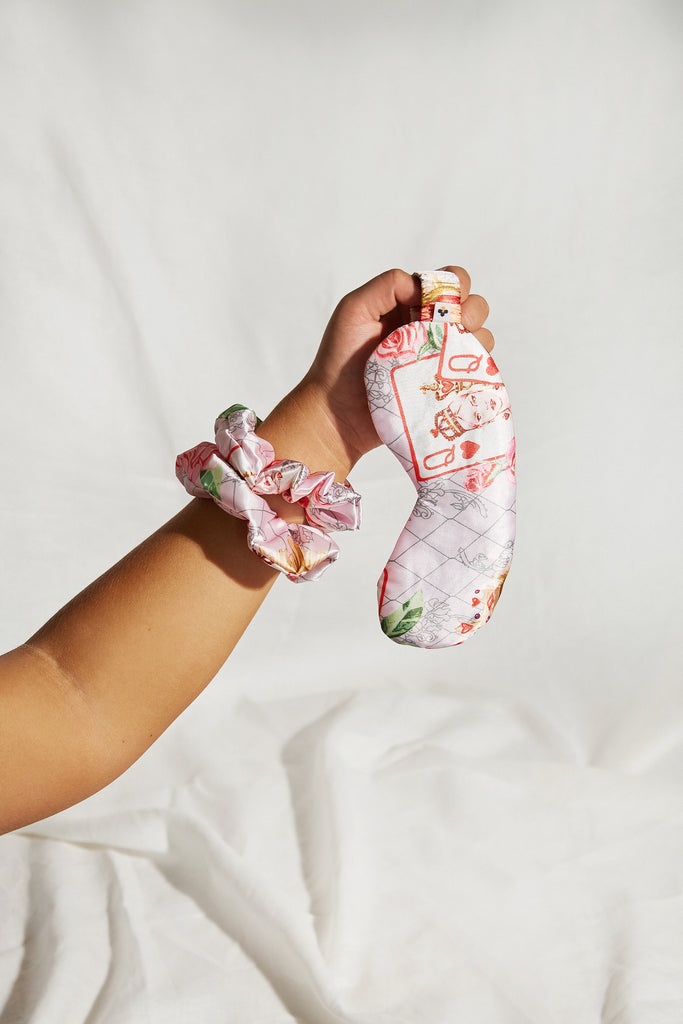 Bella Descanso luxury satin scrunchies and eye mask in Valentine's Day Queen of Hearts print. 