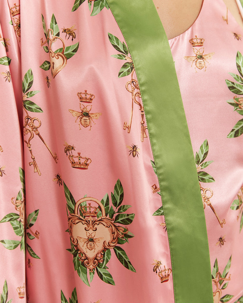 Bella Descanso luxury sleepwear. Biscayne pink luxury robe. Bella Descanso exclusive Biscayne print, featuring Surrounded Islands, Miami-inspired pink and designer-inspired gold  bees. 
